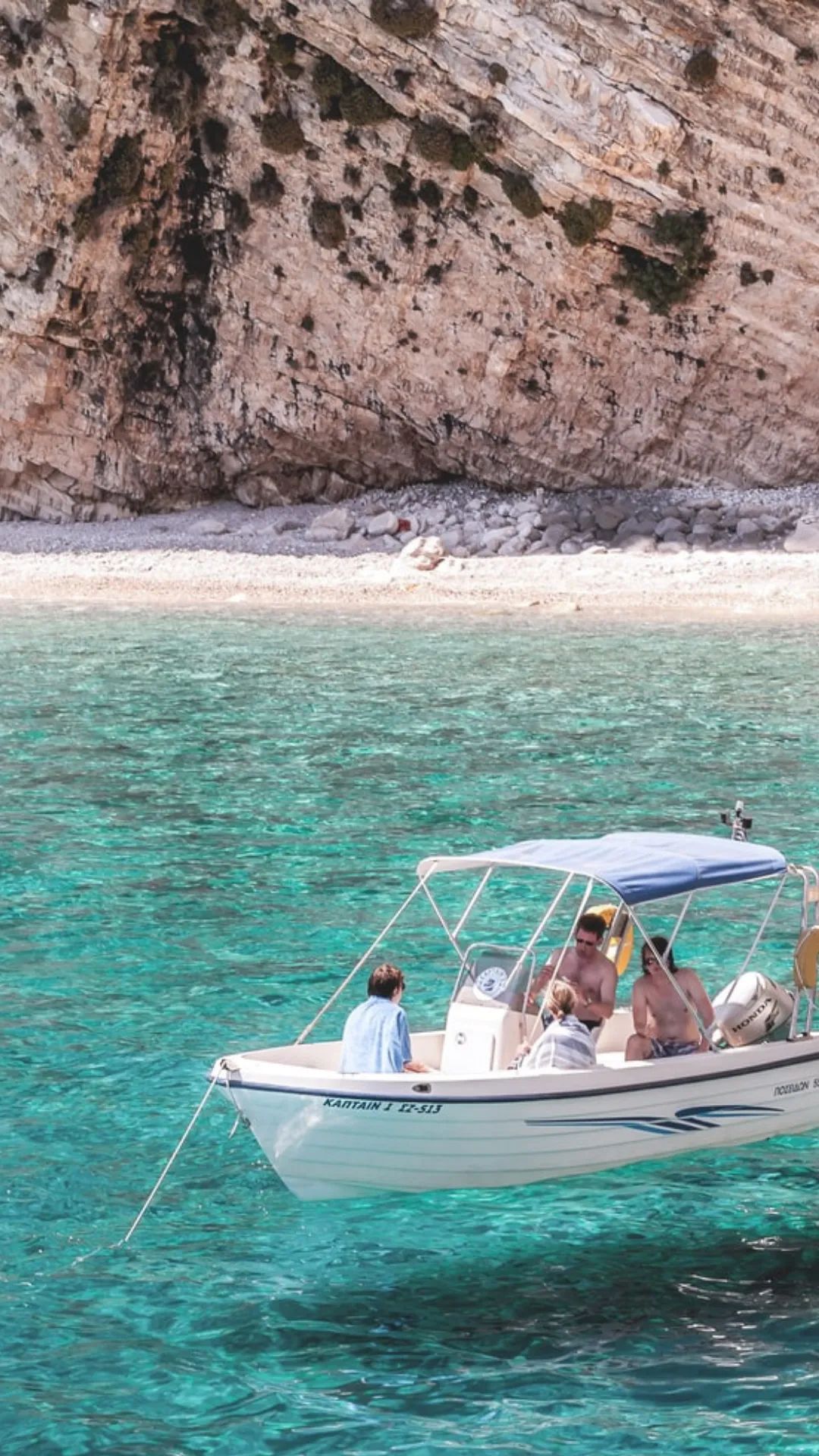 Boat trip in a turquoise cove in Salento